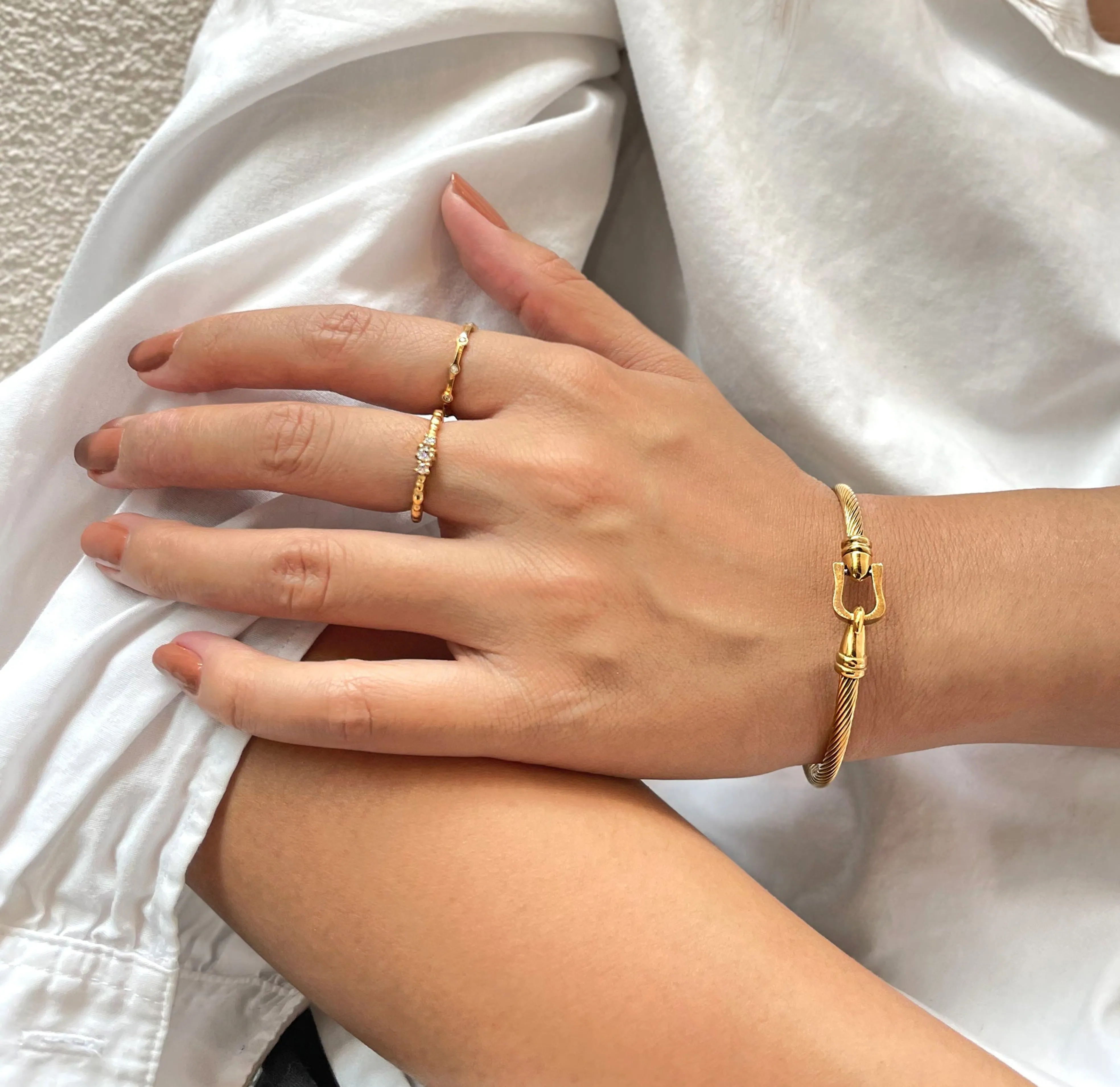 NICOLETTE GOLD CABLE BUCKLE CUFF BRACELET