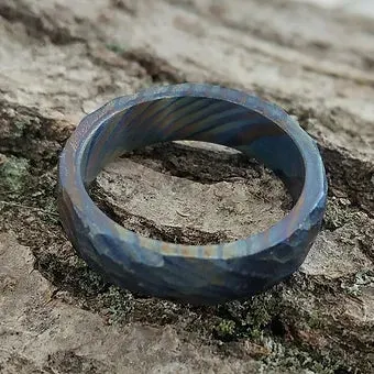 "Dragonheart" Ring Titanium Damascus Three Layer Twist Flame Anodized