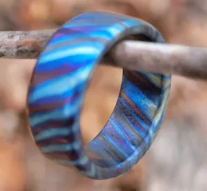 "The Rainbow Bridge Ring"  Zirconium Titanium