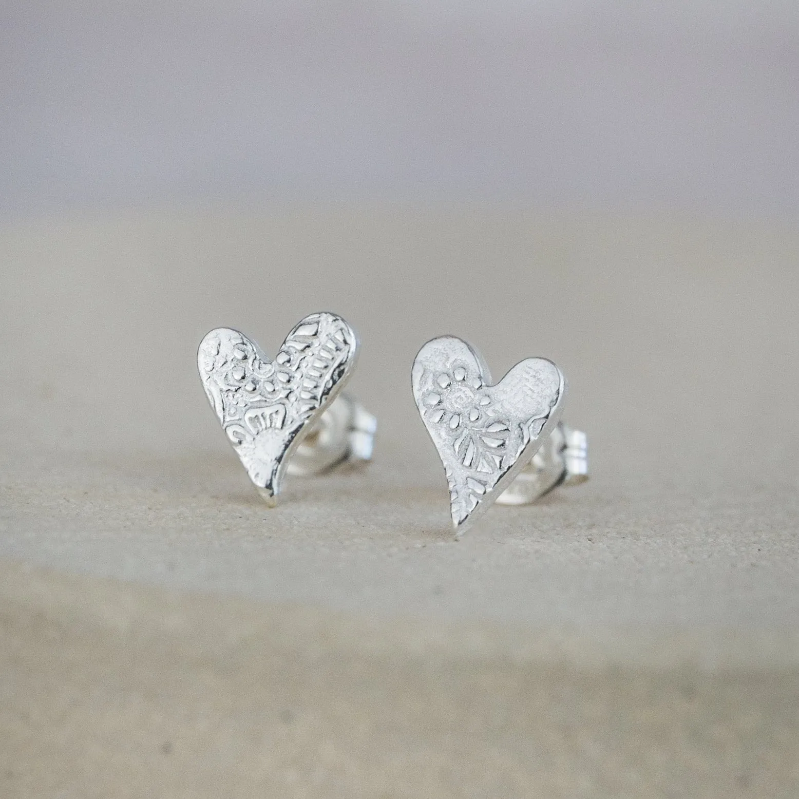 Sterling Silver Textured Studs - Tilted Heart